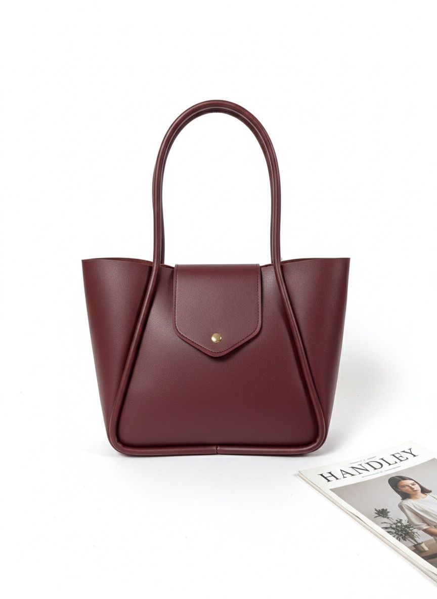 KAPAK DETATLI ŞIK TASARIMLI ELDEN TUTMALI ÇANTA