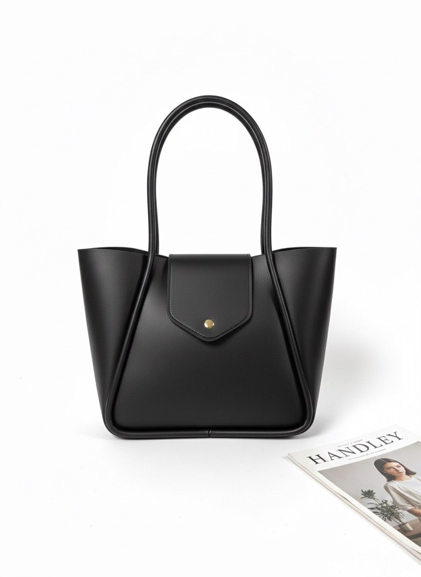 KAPAK DETATLI ŞIK TASARIMLI ELDEN TUTMALI ÇANTA